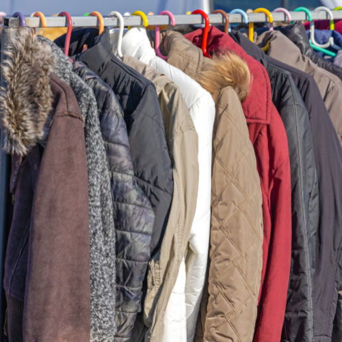 Winter coats hanging on a rack