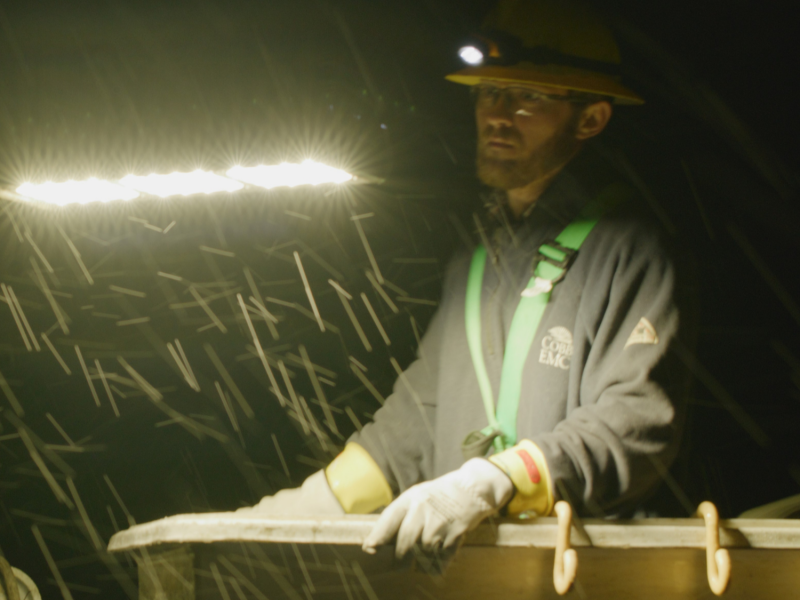 Lineman working in dark and rain