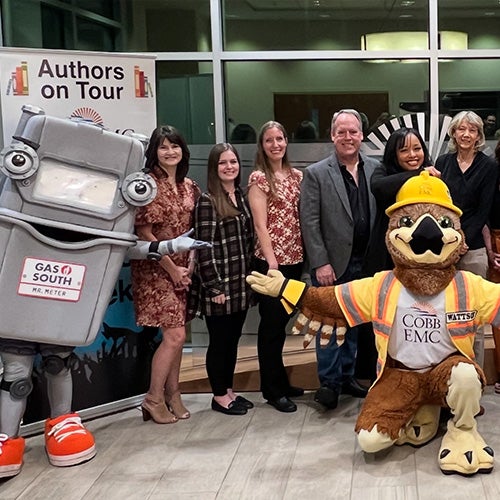 Cobb EMC and Gas South Literacy Week authors with mascot